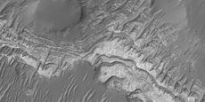 Close up of a previous image of layers in Lotto Crater, as seen by HiRISE