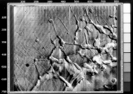 Mariner 9 view of the Noctis Labyrinthus "labyrinth" at the western end of Valles Marineris on Mars. Linear graben, grooves, and crater chains dominate this region, along with a number of flat-topped mesas. The image is roughly 400 km across, centered at 6 S, 105 W, at the edge of the Tharsis bulge. North is