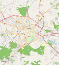 Mapa konturowa Białegostoku, blisko centrum na dole znajduje się punkt z opisem „Lotnisko Białystok-Krywlany”