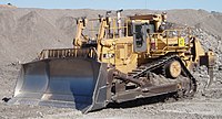 Caterpillar D11 N, ikiqat qollu sökücü ilə