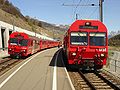 Trains régionaux RhB en gare de Sagliains.