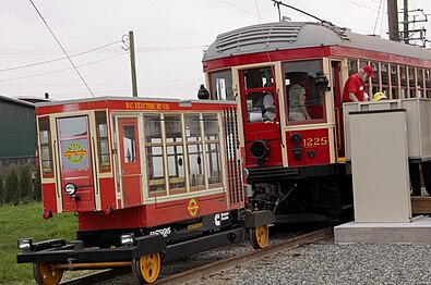 The Fraser Valley Heritage Railway Society single vehicle does not use a trolley-pole, instead it is powered by a generator towed on a small flatcar.