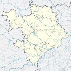 Mapa konturowa powiatu staszowskiego, blisko centrum na dole znajduje się punkt z opisem „miejsce zbrodni”