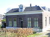 Vrijstaande blokvormige villa "Beukenheim"