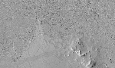 Lava flows in Elysium as seen by HiRISE. Upper part of image shows lava that solidified on the top then crumpled as lava still moved.