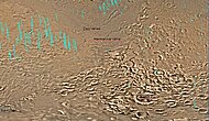 Hellas quadrangle map showing two large river valleys that slope left, toward the floor of the crater