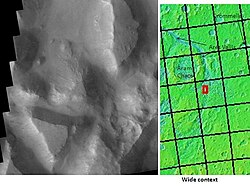 Iani Chaos, as seen by THEMIS. Sand from eroding mesas is covering brighter floor material.