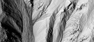 Gully alcoves as seen by HiRISE under HiWish program This image was named HiRISE Picture of the Day for June 25, 2024.