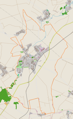 Mapa konturowa Białej, blisko centrum na lewo znajduje się punkt z opisem „Zamek w Białej”