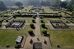 The Gardens of Shaniwar Wada are seen. The foundations of many structures as well as fountains are also present.