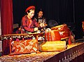 Musician at water puppet show, Hanoi