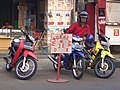 Image 42A ojek driver at the motorcycle taxi stand. (from Transport in Jakarta)