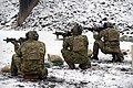 1st Battalion, 10th SFG (A) operators practice firing SOPMOD M4A1 carbine variants at the Panzer Range Complex.