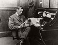 Image 13D. W. Griffith at a rolltop desk, c. 1925 (from 1920s)