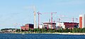 Image 56Olkiluoto 3 under construction in 2009. It was the first EPR, a modernized PWR design, to start construction. (from Nuclear power)