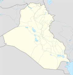 Mapa konturowa Iraku, blisko centrum u góry znajduje się punkt z opisem „Tikrit”