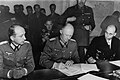 Alfred Jodl signing the WWII capitulation papers