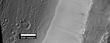 Possible pingos, as seen by HiRISE under HiWish program. Pingos contain a core of ice. They are expected to have cracks on their surfaces because water expands when it turns into ice.