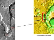 The long channel Nirgal Vallis is shown where it connects to Uzboi Vallis. The crater Luki is 21 km in diameter. Picture taken by THEMIS.