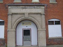 Haskelite building, East "Change Parts" above door