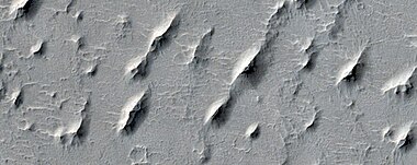 Close view of yardangs. These features are shaped by the wind.