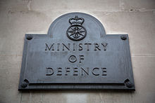 The Ministry of Defence plaque outside the south door of Main Building.