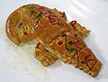 Image 48Roti buaya, a crocodile-shaped bread is often served on festive occasions. (from Jakarta)