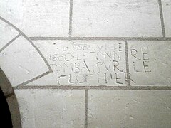 Inscription gravée sur un mur « Le 20 juillet 1660 le tonnerre tomba sur le clocher ».