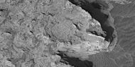 Close view of light-toned surfaces, as seen by HiRISE under HiWish program