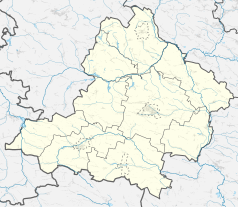 Mapa konturowa powiatu jędrzejowskiego, na dole znajduje się punkt z opisem „Cmentarz żydowski w Wodzisławiu”