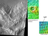 Small valleys in the wall of a crater in Deuteronilus Mensae, as seen by THEMIS.