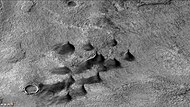 Dunes and dust devil tracks on floor of Huggins Crater, as seen by CTX camera (on Mars Reconnaissance Orbiter). Dark streaks on dunes are dust devil tracks. Note: this is an enlargement of the previous image of Huggins Crater.