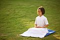 An Cambodian girl resting at a park