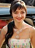 Maria de Medeiros at the 2007 Cannes Film Festival, smiling and looking to the front