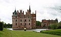 Exterior view of Egeskov Castle with a gold covered Superellipse