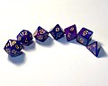 Image 7D&D uses polyhedral dice to resolve in-game events. These are abbreviated by a 'd' followed by the number of sides. Shown from left to right are a d20, d12, d%, d10, d8, d6, and a d4. A d% and d10 can be rolled together to produce a number between 1 and 100. (from Dungeons & Dragons)