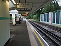 Platforms looking south ("westbound" direction). Visible on far right is a siding from Cockfosters depot (to the north).