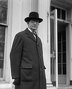 Politician William J. Fields wearing an overcoat and soft-crowned hat with a bow tie, December 1923.