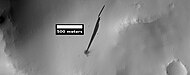 New streak that was caused by a recent impact that created a small crater, as seen by HiRISE. Location is the Arabia quadrangle.