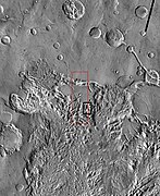 THEMIS image of wide view of following HiRISE images. Black box shows location of HiRISE images. Image is part of the Aureum Chaos. Click on image for details.