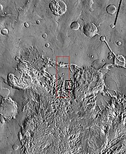 THEMIS image of wide view of following HiRISE images. Black box shows approximate location of HiRISE images. This image is just a part of the vast area known as Aureum Chaos. Click on image to see more details.