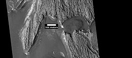 Light-toned deposit in Arsinoes Chaos, as seen by HiRISE under HiWish program. Note: this field can be found in the previous wide image of Arsinoes Chaos, as seen by CTX camera (on Mars Reconnaissance Orbiter).