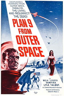 "PLAN 9 FROM OUTER SPACE" in large red letters adorns a beam from a night sky containing spacecraft and warplanes. The foreground has the head of a man in a bubble-headed red spacesuit, a caped vampire attacking a victim, a seductive vampiress and gravediggers at work. Above the title is "UNSPEAKABLE HORRORS FROM OUTER SPACE PARALYZE THE LIVING AND RESURRECT THE DEAD!"; below are "BELA LUGOSI", "VAMPIRA" and "LYLE TALBOT".