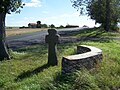 Stone cross and windmill near Aschara