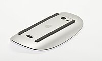 The underside of the first-generation Magic Mouse, showing the battery cover