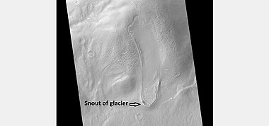 Tongue-shaped glacier, as seen by HiRISE under the HiWish program. Ice may exist in the glacier, even today, beneath an insulating layer of dirt.