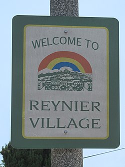 "Welcome to Reynier Village" sign located at the intersection of Cadillac & Shenandoah.