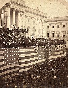 A large crowd of people outside the United States Capitol building