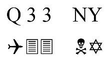 Q33 NY in Wingdings, scritto in alfaveto latino e sotto in Wingdings; in questo font vengono rappresentati un aereo rivolto verso destra, due fogli rettangolari stampati, un teschio con due ossa incrociate sotto e la Stella di David