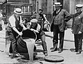 Image 7Prohibition agents emptying barrels of alcohol (from 1920s)